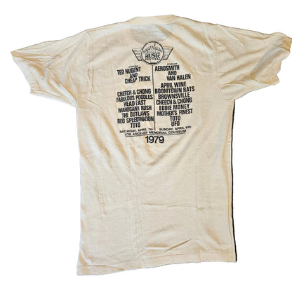 Back of California World Music Festival 1979 tee showing full artist lineup including Van Halen, Aerosmith, Ted Nugent, Cheap Trick, REO Speedwagon and more, Los Angeles Memorial Coliseum April 7-8 1979