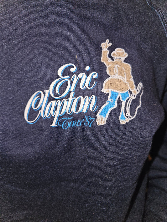 Eric Clapton Tour '87 sweatshirt - close-up of cowboy silhouette and Tour '87 script logo