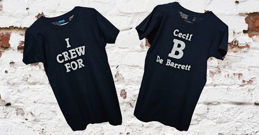 Front and back of Bill Doc Gans's black vintage Screen Stars crew shirt: I CREW FOR / Cecil B De Barrett.
