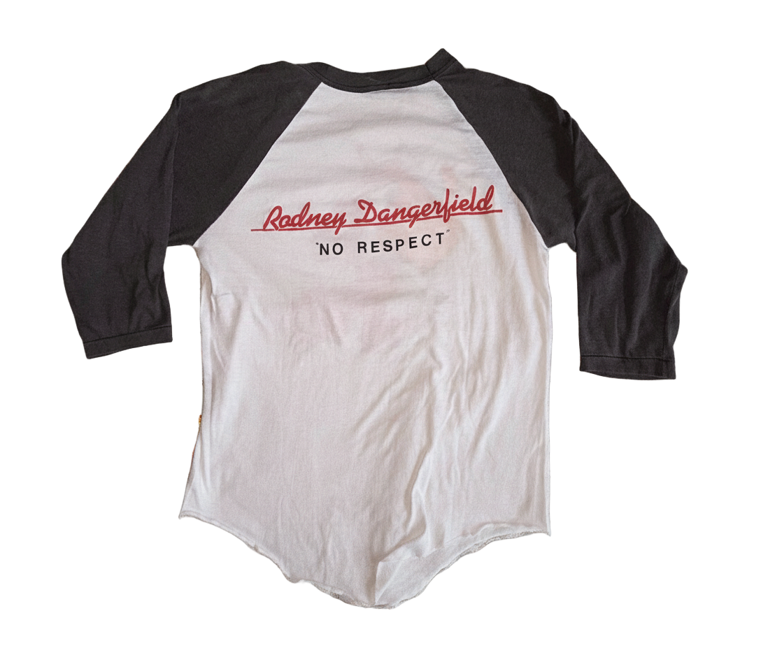 Baseball shirt with black sleeves and white body on a white background