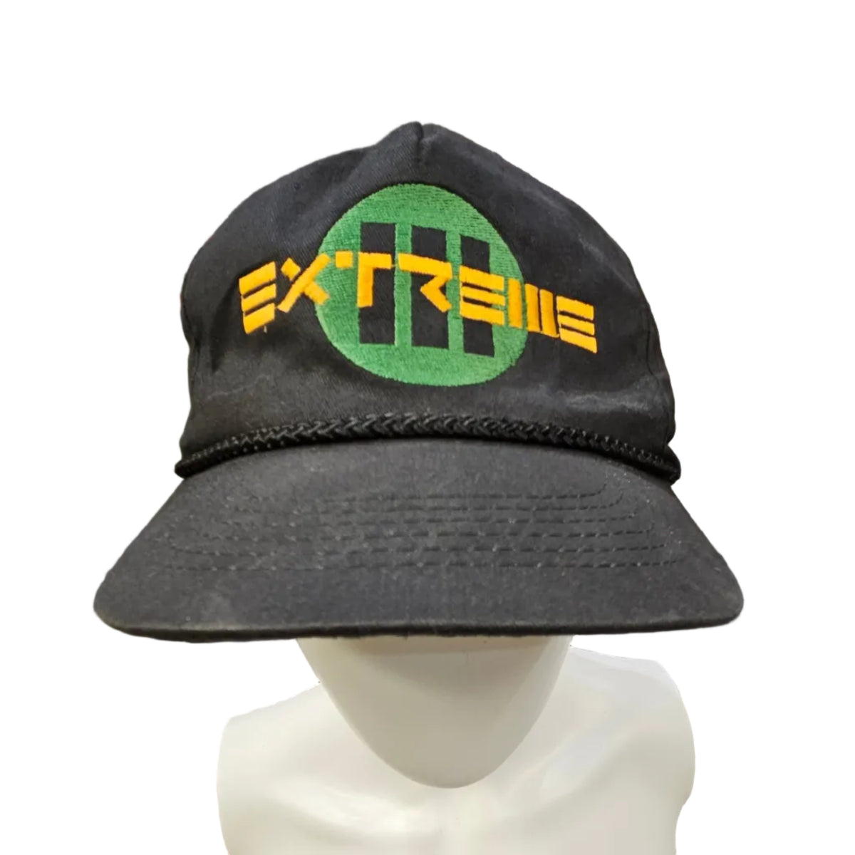 Original Extreme III braided-brim cap from Bruce Jones’s collection; front embroidery and wear.
